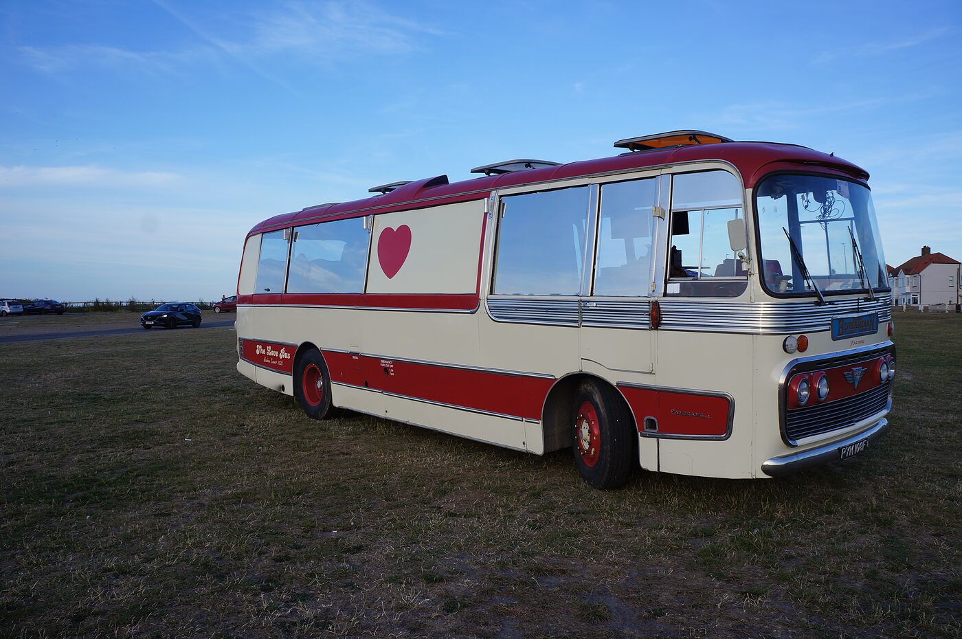 The Love Bus UK, a 1968 Plaxton Panorama coach, side and front view
