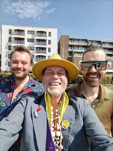 Laurence McMahon, The Great Lorenzo, and two friends on the seafront in the sunshine