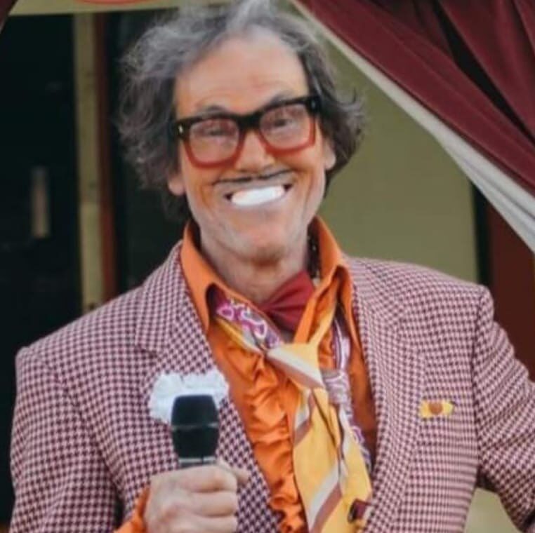 Close portrait of The Great Lorenzo with microphone
