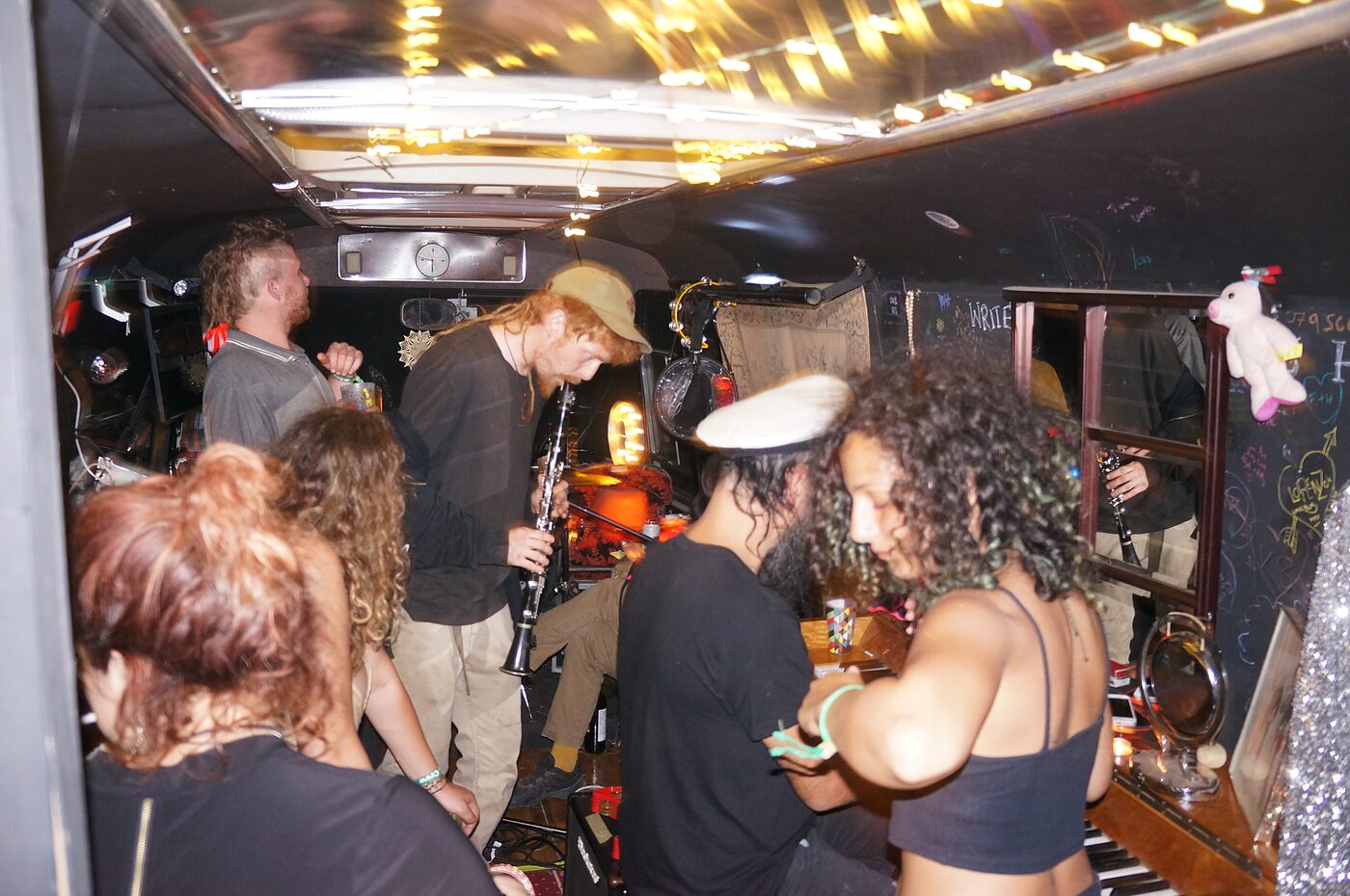 A full house of guests inside The Love Bus during a set