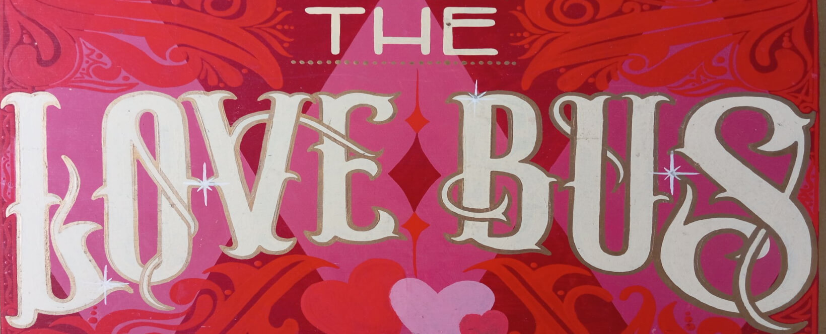 The Love Bus painted sign