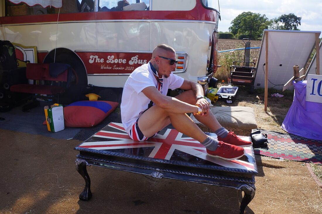 The Union Jack chaise set out beside The Love Bus